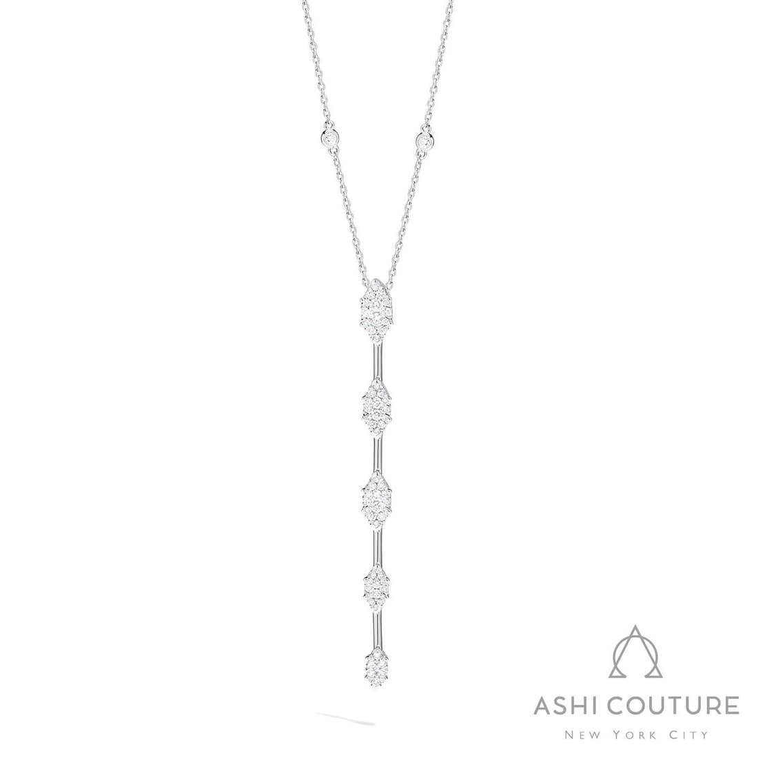 1.15 ctw White Diamond Cluster Pendant Necklace 18K White Gold: Defining modern elegance, this magnificent Marquise Station Bar necklace featuring Natural Diamonds captures the essence of style. Securely held in a classic Cluster design, the necklace is forged fro
