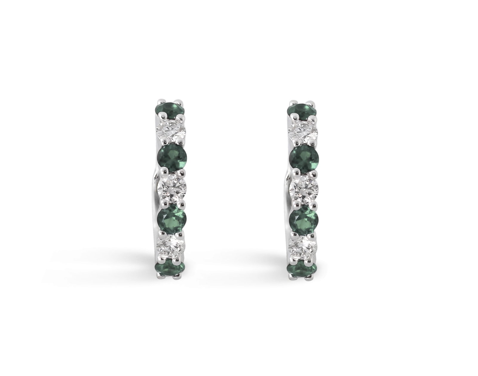 0.93ctw Alexandrite and 0.36ct White Diamond 14K White Gold Huggie Earrings: Exuding opulence and grace, this elegant Huggies pair of earrings featuring Alexandrite, White Diamond is crafted for the distinguished. Showcasing the gems in a Shared Prong arrangement, the earrings