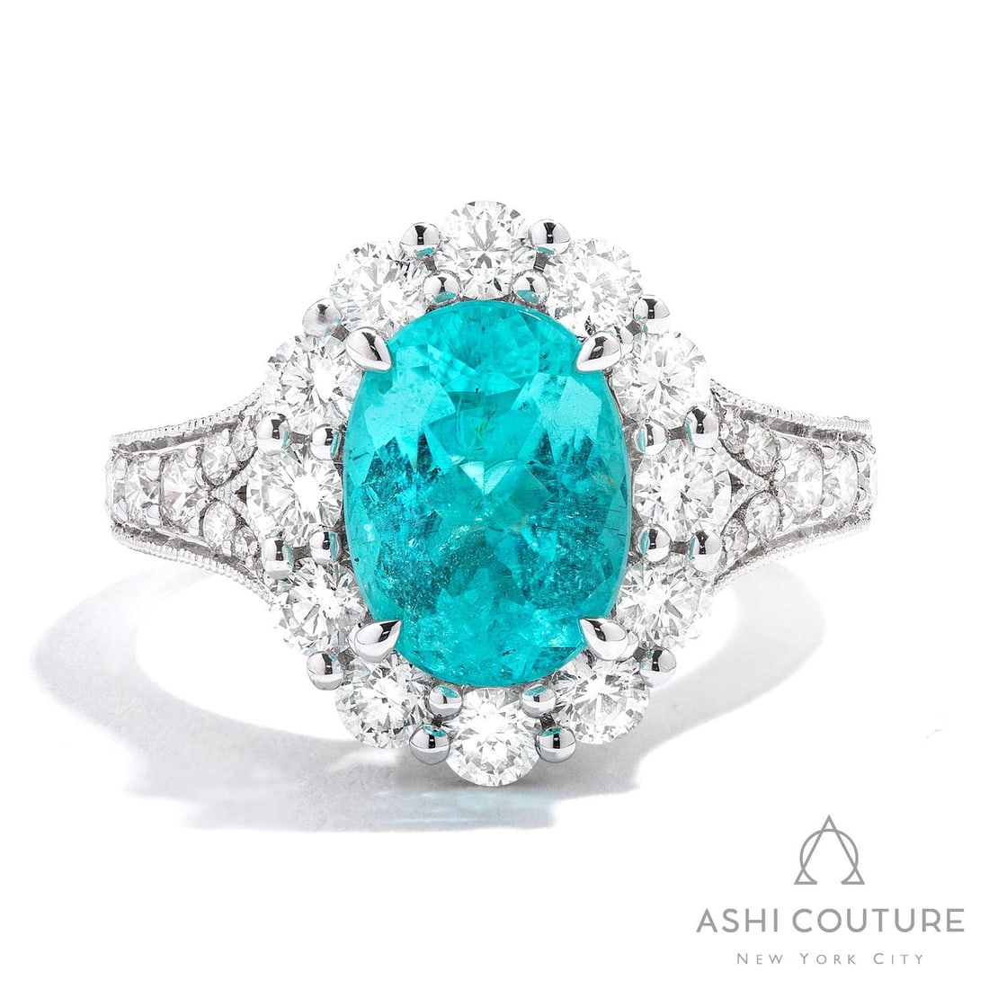Oval Topaz and 1.75 ctw Diamond Halo 18K White Gold Ring: Retail Value: $52,905 Captured in a moment of brilliance, this stunning Halo ring featuring Topaz, White Diamond speaks to the connoisseur. A detailed Halo gallery secures the stones, rendered in 6.0 