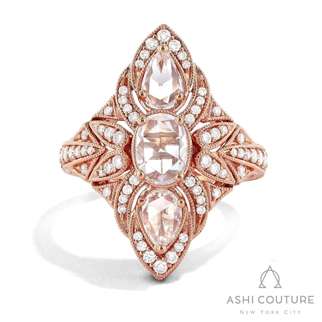 1.96 ctw White Diamond Vintage 18K Rose Gold Ring: Defining modern elegance, this magnificent Vintage ring featuring White Diamond captures the essence of style. Securely held in a classic Three-Stone design, the ring is forged from 8.7 grams of high-