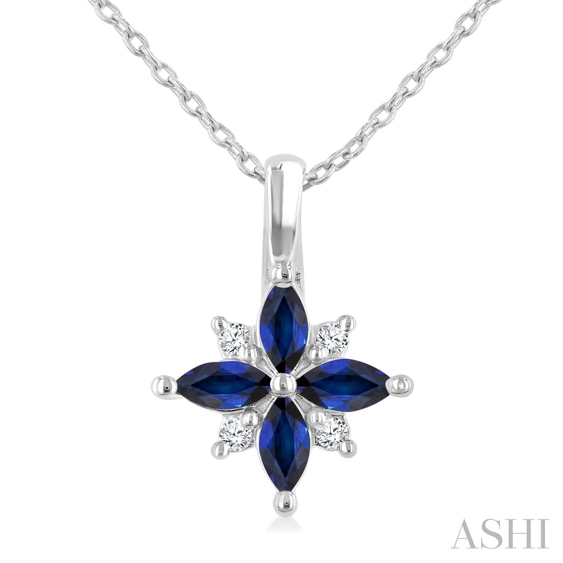 4x2mm Sapphire and 0.04 ctw Diamond 10K White Gold Pendant: A vision of luxury, this elegant Blossom pendant featuring Sapphire, White Diamond defines sophistication. Securely held in a classic Cluster design, the pendant is forged from 1.2 grams of high-polis
