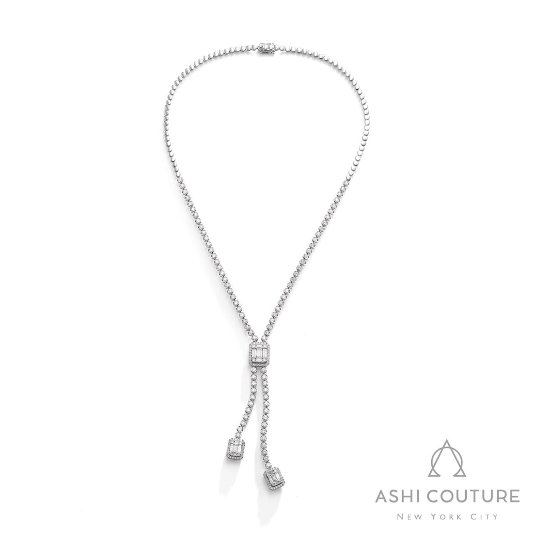 6.75 ctw Baguette & Round Diamond 18K White Gold Lariat Necklace: Rare and radiant, this breathtaking Architectural Lariat Necklace featuring White Diamond offers a touch of the extraordinary. Crafted with precision, the Lariat setting is seamlessly integrated into 