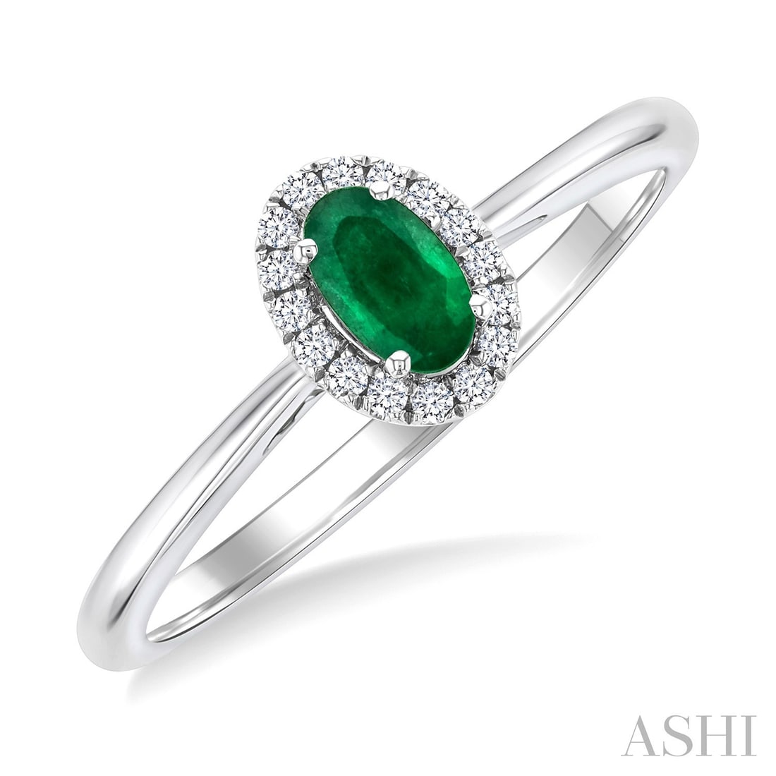 5x3mm Emerald and 0.07 ctw Diamond 14K White Gold Ring: Defining modern elegance, this elegant Halo ring featuring Emerald, White Diamond captures the essence of style. Securely held in a classic Halo design, the ring is forged from 1.45 grams of high-poli