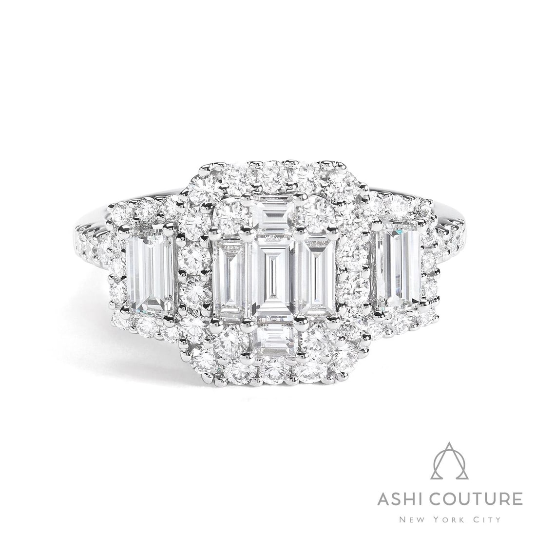 Empress 1.73 ctw Baguette & Round Diamond 18K White Gold Ring: Defining modern elegance, this magnificent Baguette Three-Stone ring featuring White Diamond captures the essence of style. Expertly mounted in a Three-Stone Cluster with Halo setting, the ring is cra