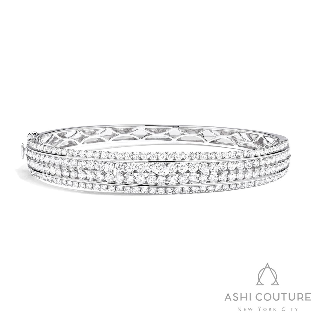 Classic Duchess 4.86 ctw Diamond 4-Row 18K White Gold Bangle: A vision of luxury, this breathtaking 4-Row bangle featuring White Diamond defines sophistication. The gemstones are nestled within a Line framework, supported by a substantial 21.3 grams 18K White Go