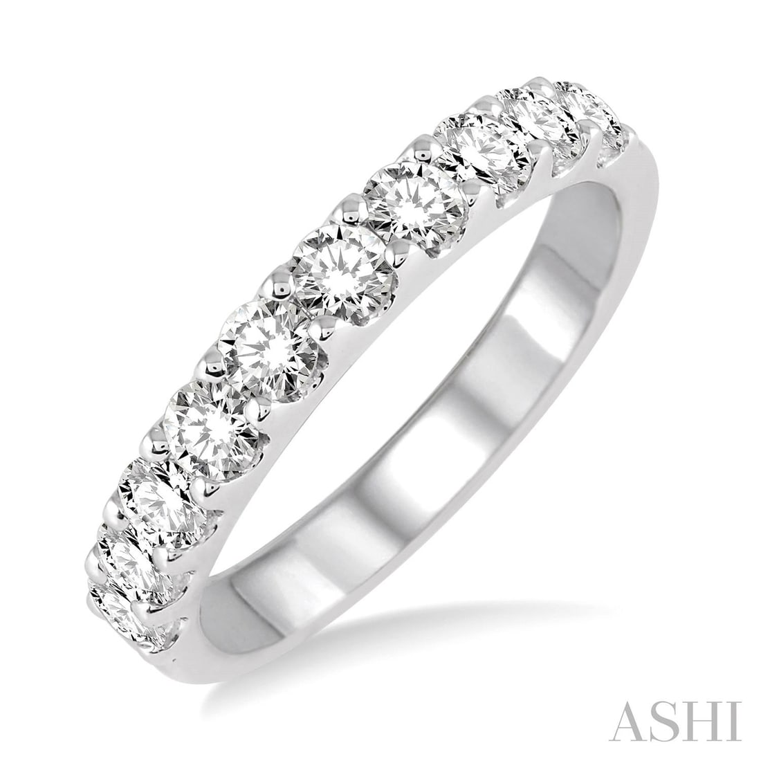 1.00 ctw Diamond Wedding Band 14K White Gold Ring: A vision of luxury, this magnificent Round Cut Wedding Band ring featuring White Diamond defines sophistication. The gemstones are nestled within a Half-Eternity framework, supported by a substantial 