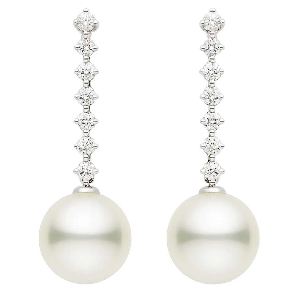 South Sea Pearl Earrings with 0.42ct Diamonds in 18k White Gold: Exuding sophistication, this pair of earrings features lustrous South Sea Pearls, elegantly suspended from a cascade of Diamonds. The Diamonds, with a total carat weight of 0.42, are round cut and dis