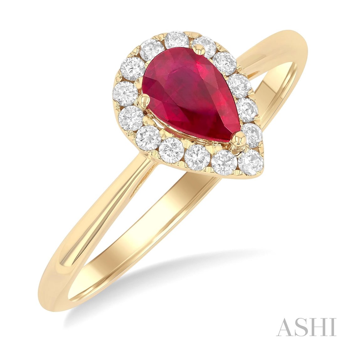 6x4mm Pear Ruby and 0.15 ctw Diamond 14K Yellow Gold Ring: Captured in a moment of brilliance, this magnificent Halo ring featuring Ruby, White Diamond speaks to the connoisseur. Expertly mounted in a Halo setting, the ring is crafted in 1.45 grams of solid 1