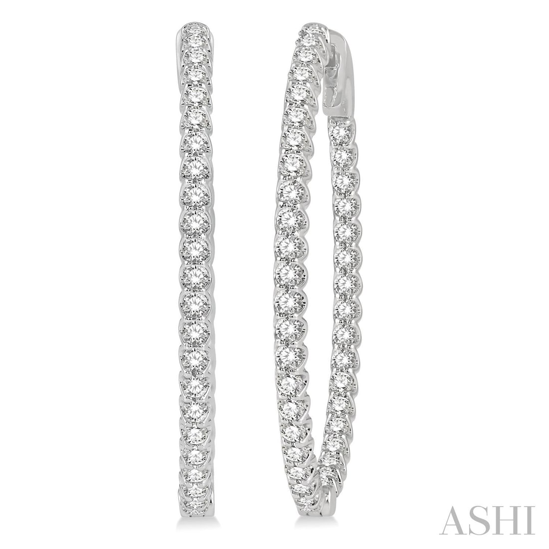 1.52 ctw Inside-Out Diamond Hoop 14K White Gold Earrings: Timeless and sophisticated, this elegant Oval Shape Hoop pair of earrings featuring Natural Diamonds radiates enduring beauty. The gemstones are nestled within a Hoop framework, supported by a substan