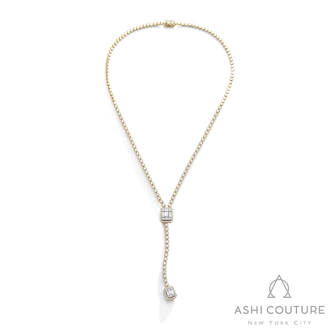 5.26 ctw Baguette & Round Diamond 18K Yellow & White Gold Lariat Necklace: A vision of luxury, this exquisite Empress necklace featuring White Diamond defines sophistication. Expertly mounted in a Lariat setting, the necklace is crafted in 25.85 grams of solid 18K Yellow & W