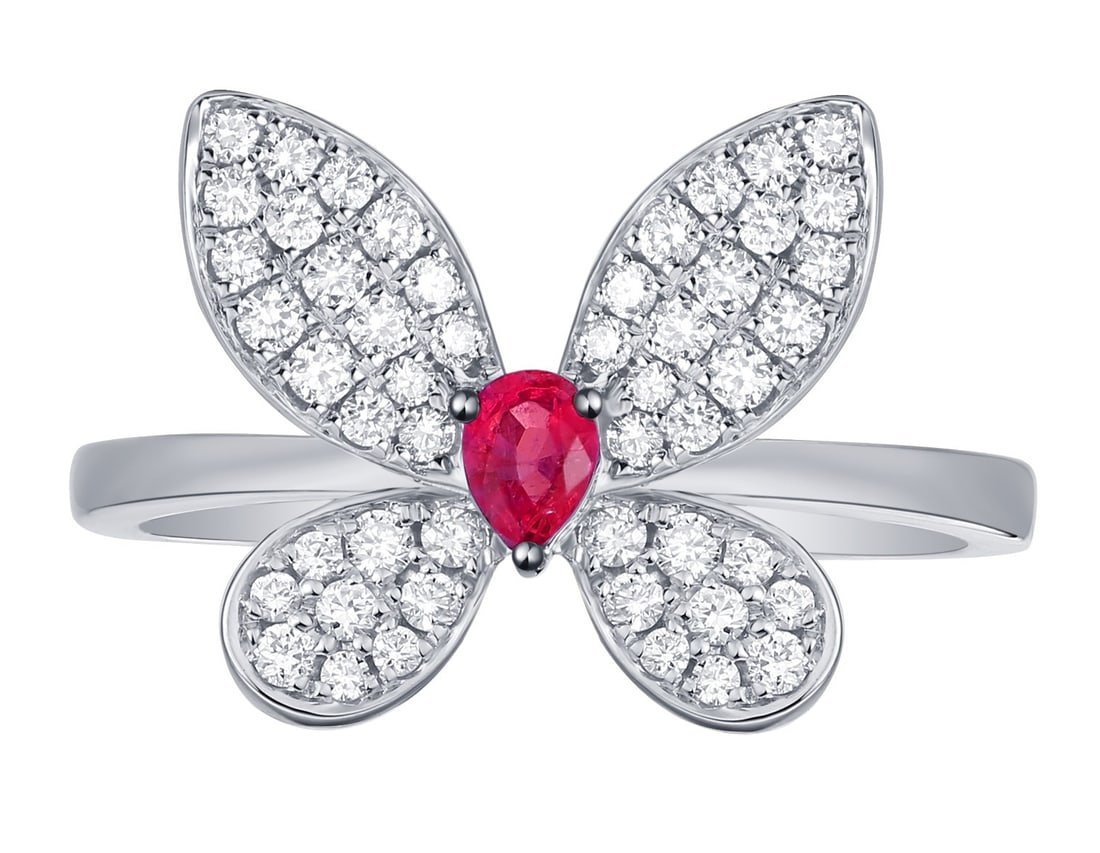 0.15ct Ruby and 0.36ctw White Diamond 14K White Gold Butterfly Ring: A symphony of light and color, this magnificent Butterfly ring featuring Ruby, White Diamond embodies the pinnacle of luxury. Securely held in a classic Cluster design, the ring is forged from high-po