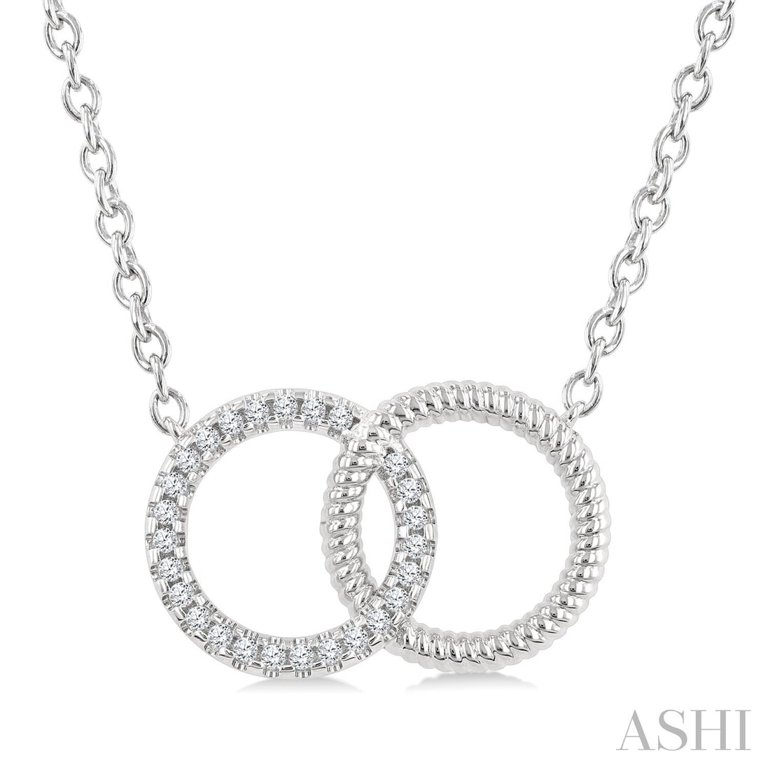 0.10 ctw Diamond Interlocked Circle Petite 10K White Gold Pendant: A vision of luxury, this elegant Interlocked Circle necklace featuring Natural Diamonds defines sophistication. Securely held in a classic Cluster design, the necklace is forged from 1.2 grams of high