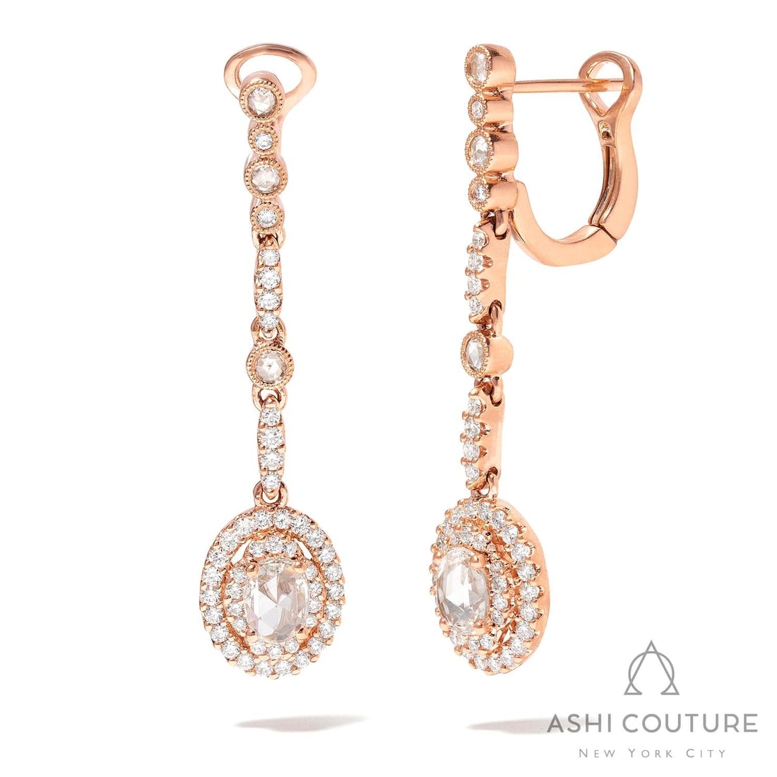 1.70 ctw Diamond Mademoiselle Floral 18k Rose Gold Drop Earrings: Retail Value: $15,885 A testament to superior craftsmanship, this magnificent Floral Drop pair of earrings featuring White Diamond is unparalleled. Securely held in a classic Halo design, the earrings