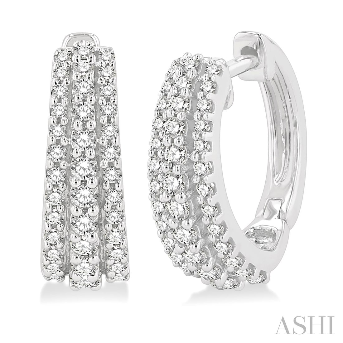 0.52 ctw White Diamond Triple Row 14K White Gold Huggie Earrings: A vision of luxury, this stunning Triple Row pair of earrings featuring Natural Diamonds defines sophistication. Expertly mounted in a Shared Prong setting, the earrings are crafted in 3.4 grams of so
