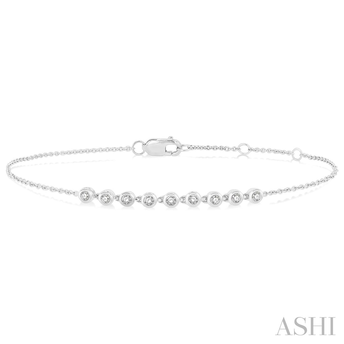 0.19 ctw Petite Bezel White Diamond 10K White Gold Link Bracelet: Exuding opulence and grace, this elegant Bezel bracelet featuring White Diamond is crafted for the distinguished. Showcasing the gems in a Bezel arrangement, the bracelet consists of 1.8 grams of 10K 
