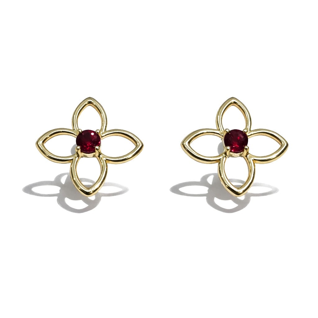 0.61ctw Ruby Clover Studs 14K Yellow Gold Earrings: Exuding opulence and grace, this elegant Clover pair of earrings featuring Ruby is crafted for the distinguished. A detailed Bezel gallery secures the stones, rendered in 2.57 grams of lustrous 14K Ye