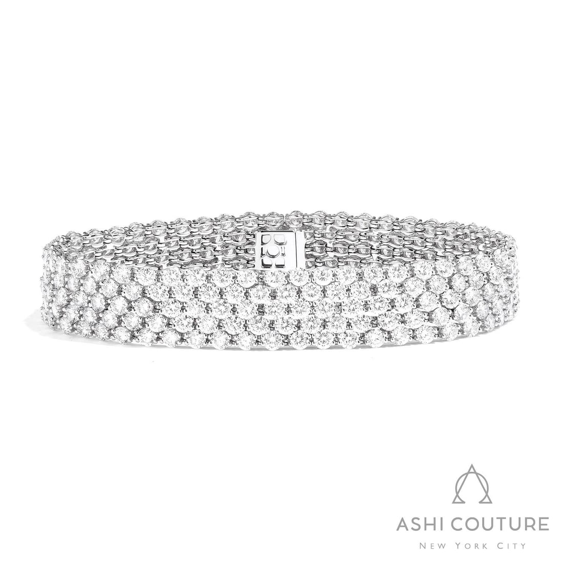21.56 ctw Diamond Five-Row 18K White Gold Tennis Bracelet: Exuding opulence and grace, this breathtaking Five-Row bracelet featuring White Diamond is crafted for the distinguished. Showcasing the gems in a Five-Row Tennis Bracelet arrangement, the bracelet co