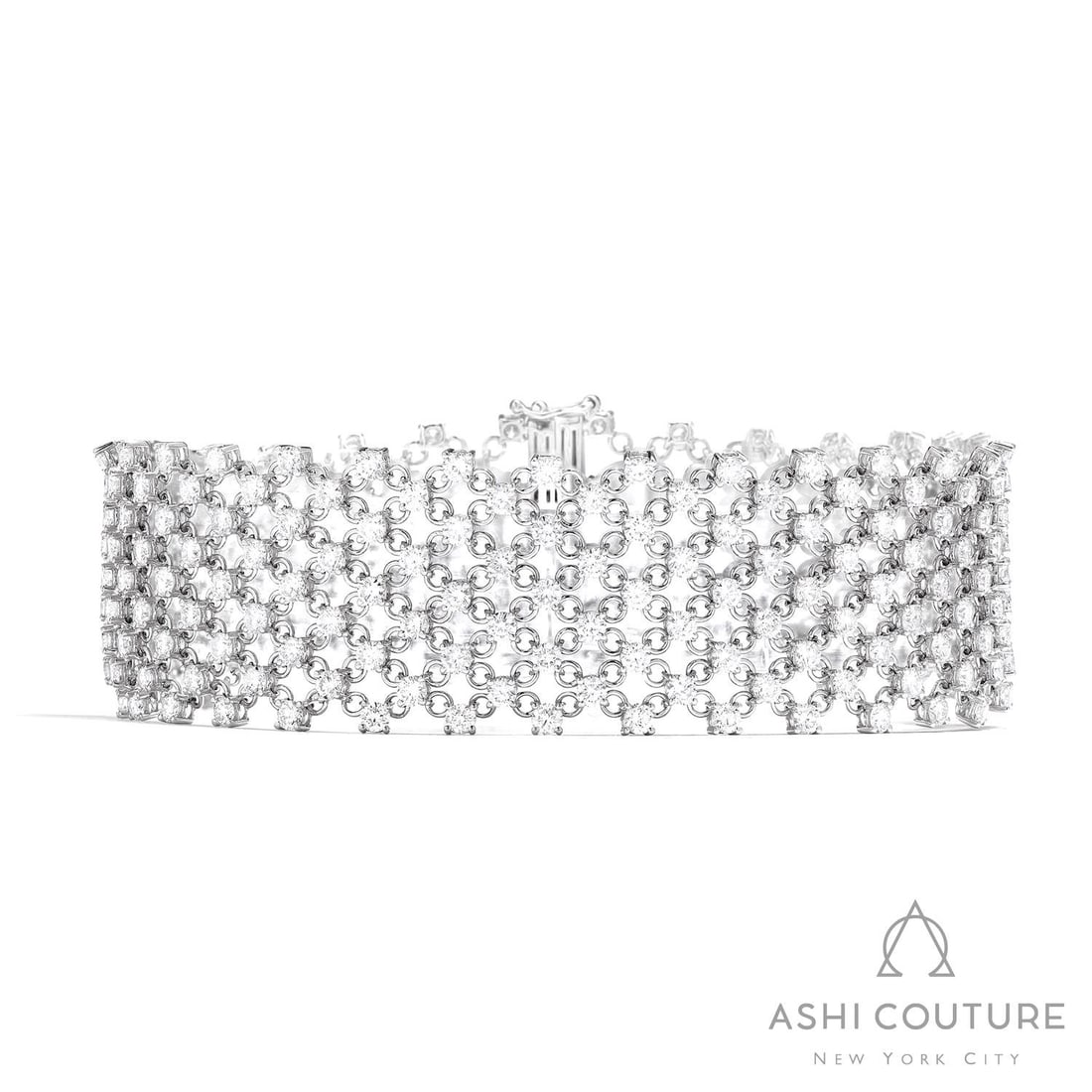 11.49 ctw White Diamond Woven Silk 18K White Gold Bracelet: Epitomizing grandeur, this elegant Woven Silk bracelet featuring White Diamond stands as a beacon of refined taste. Crafted with precision, the Mesh/Fabric Link setting is seamlessly integrated into 2