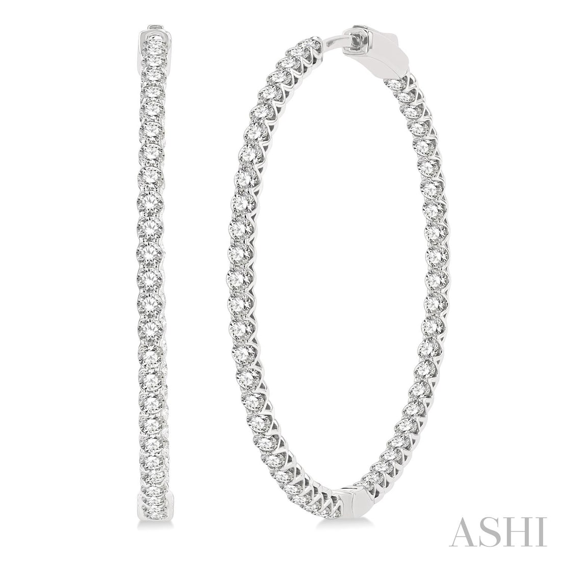 4.05 ctw Inside-Out Diamond 14K White Gold Hoop Earrings: Rare and radiant, this breathtaking Inside-Out Hoop pair of earrings featuring White Diamond offers a touch of the extraordinary. Crafted with precision, the Inside-Out Hoop setting is seamlessly inte