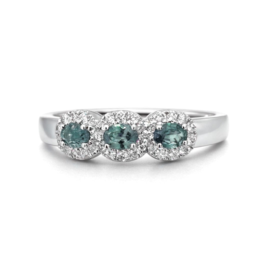 0.33ct Alexandrite and 0.17ctw Diamond 14K White Gold Ring: Rare and radiant, this exquisite Halo ring featuring Alexandrite, White Diamond offers a touch of the extraordinary. Showcasing the gems in a Three-Stone Halo arrangement, the ring consists of 2.5 gra