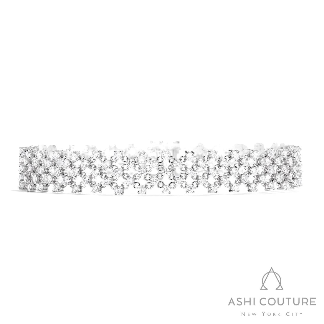 4.78 ctw Silk Diamond 18K White Gold Bracelet: Rare and radiant, this stunning Silk bracelet featuring White Diamond offers a touch of the extraordinary. A detailed Lattice gallery secures the stones, rendered in 11.0 grams of lustrous 18K White G