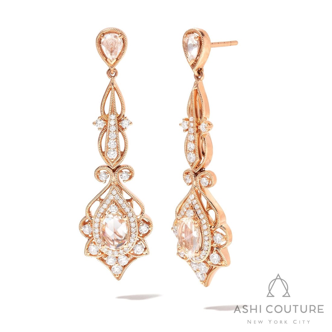 2.66 ctw Fancy Color Diamond and White Diamond 18k Rose Gold Earrings: Retail Value: $24,315 Timeless and sophisticated, this magnificent Floral pair of earrings featuring Fancy Color Diamond, White Diamond radiates enduring beauty. Showcasing the gems in a Drop Cluster 