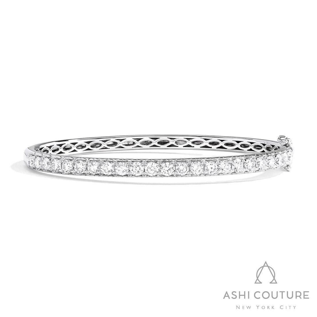 2.99 ctw Diamond 18K White Gold Bangle: Timeless and sophisticated, this elegant Timeless bangle featuring White Diamond radiates enduring beauty. Expertly mounted in a Shared Prong Bangle setting, the bangle is crafted in 15.75 grams of so