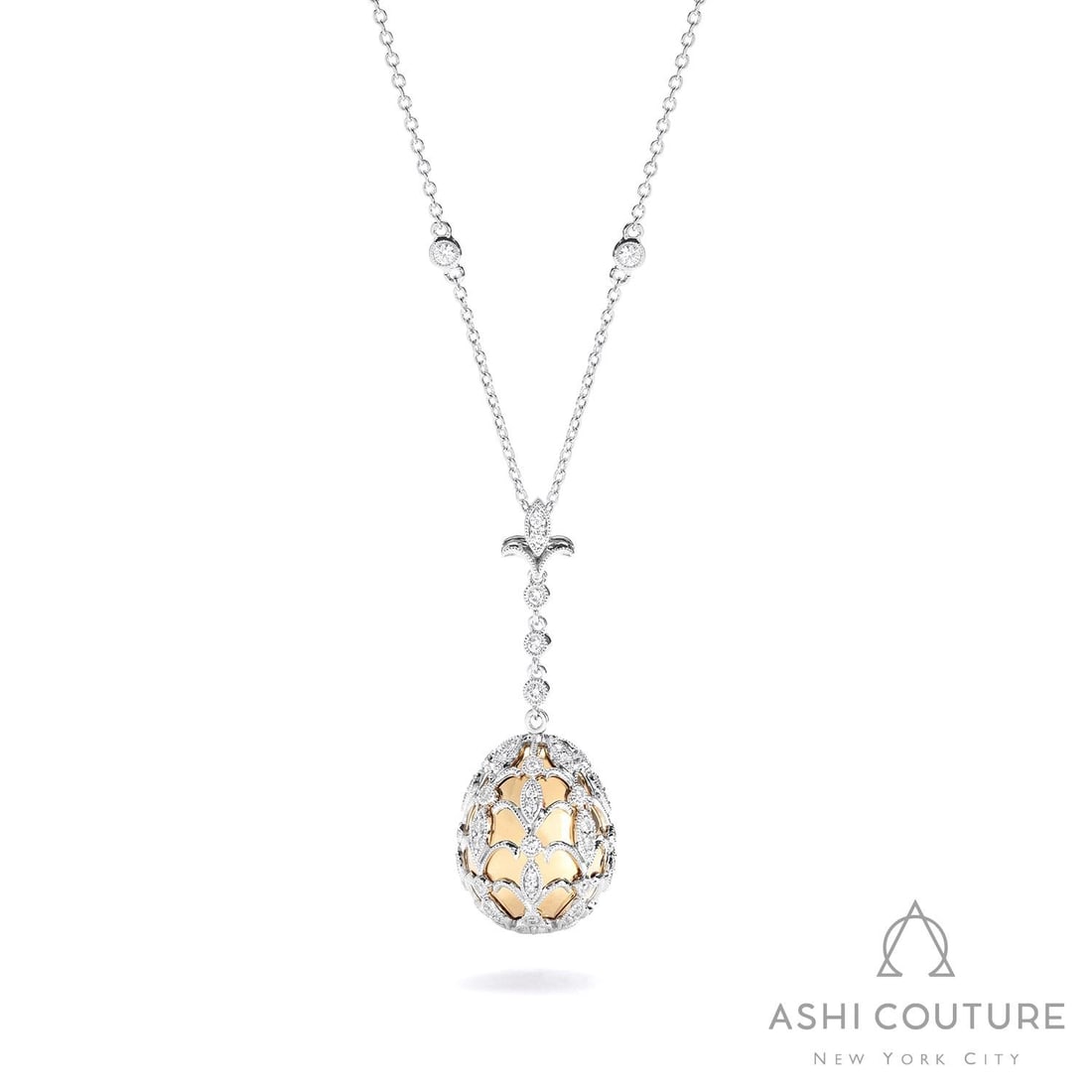0.84 ctw Diamond 18K Yellow & White Gold Pendant: Epitomizing grandeur, this stunning Cage Drop necklace featuring Natural Diamonds stands as a beacon of refined taste. Showcasing the gems in a Drop Pendant arrangement, the necklace consists of 7.75 
