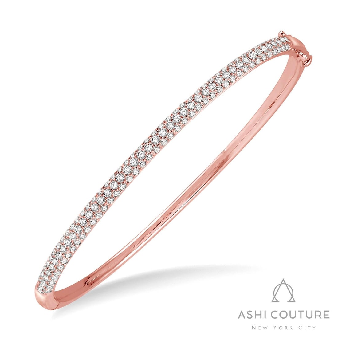 1.58 ctw Three-Row Diamond Duchess Bangle in 18K Rose Gold: A symphony of light and color, this stunning Three-Row Duchess bangle featuring White Diamond embodies the pinnacle of luxury. Expertly mounted in a Pave setting, the bangle is crafted in 14.3 grams o