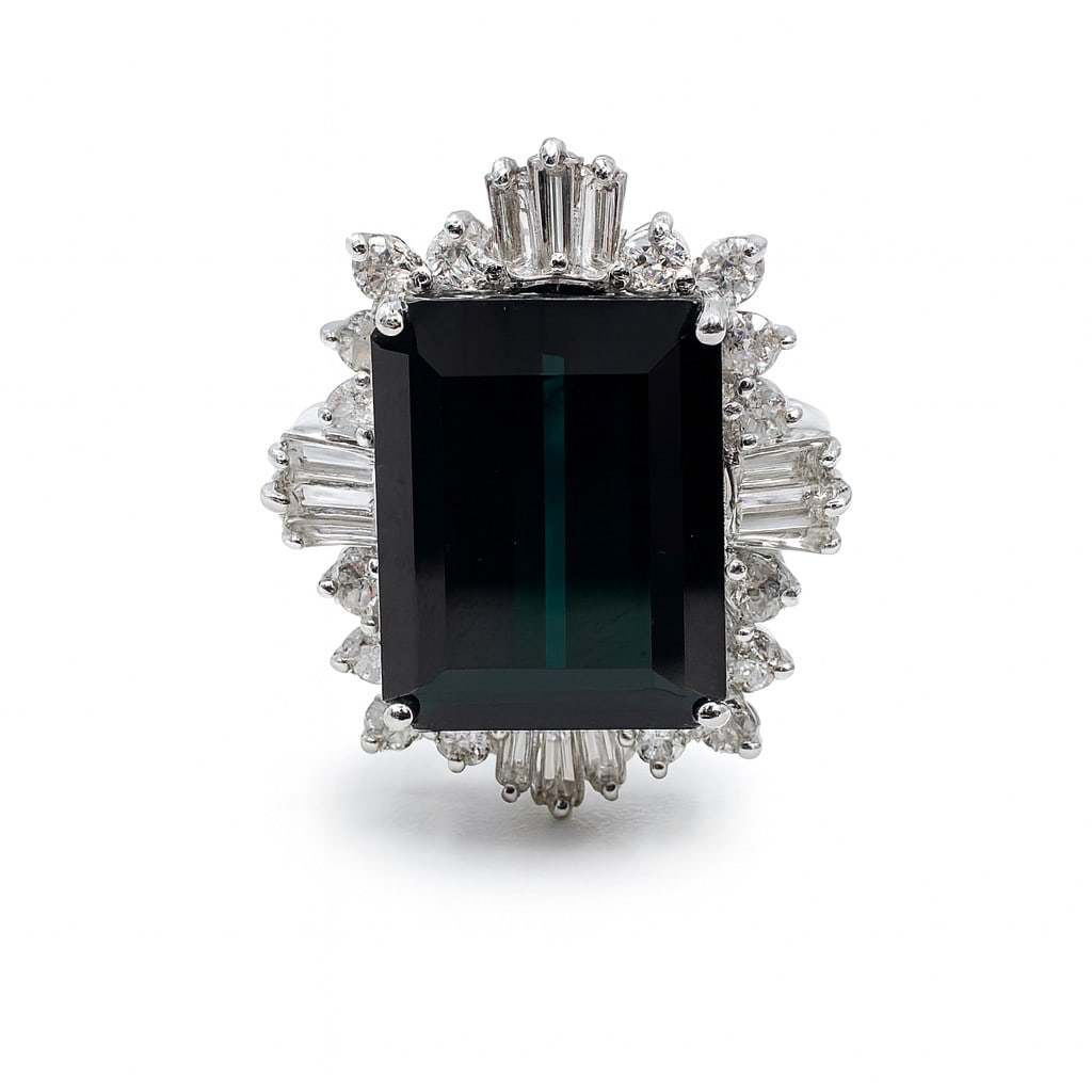 12.47ct Emerald Cut Tourmaline and 2.00ct Diamond 14K White Gold Halo Ring: Rare and radiant, this breathtaking Halo ring featuring Tourmaline, White Diamond offers a touch of the extraordinary. Crafted with precision, the Halo setting is seamlessly integrated into 6.2 grams 