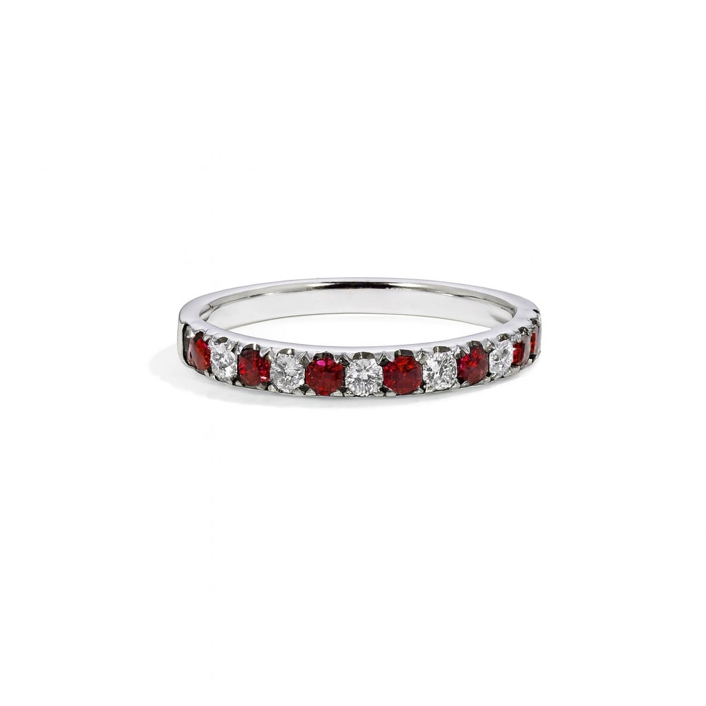 0.53ctw Ruby and Diamond Alternating 14K White Gold Band Ring: A symphony of light and color, this elegant Alternating ring featuring Ruby, White Diamond embodies the pinnacle of luxury. The gemstones are nestled within a Shared Prong Band framework, supported by