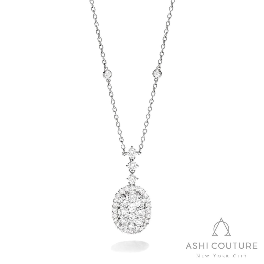 2.44 ctw White Diamond Fiori Oval Drop Cluster 18K White Gold Pendant Necklace: A vision of luxury, this stunning Fiori Oval Drop Cluster necklace featuring White Diamond defines sophistication. Expertly mounted in a Cluster setting, the necklace is crafted in 6.0 grams of solid 
