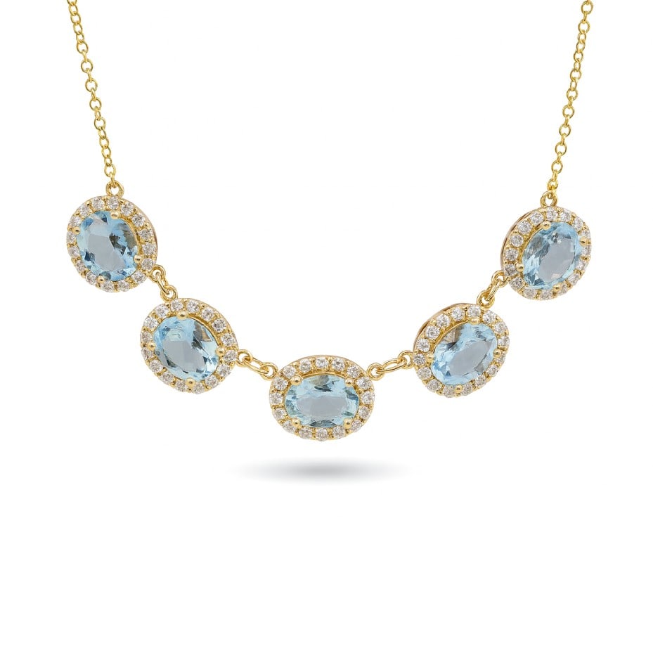 4.88ct Oval Aquamarine and 0.99ctw Diamond 14K Yellow Gold Necklace: Exuding opulence and grace, this elegant Halo necklace featuring Aquamarine, White Diamond is crafted for the distinguished. Showcasing the gems in a Halo arrangement, the necklace consists of 7.03 gr