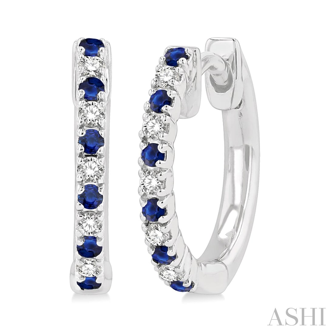 Petite 1.35mm Sapphire & 0.11 ctw Diamond 10K White Gold Huggies Earrings: Exuding opulence and grace, this elegant Hoop pair of earrings featuring Blue Sapphire, White Diamond is crafted for the distinguished. A detailed Prong gallery secures the stones, rendered in 2.0 gra