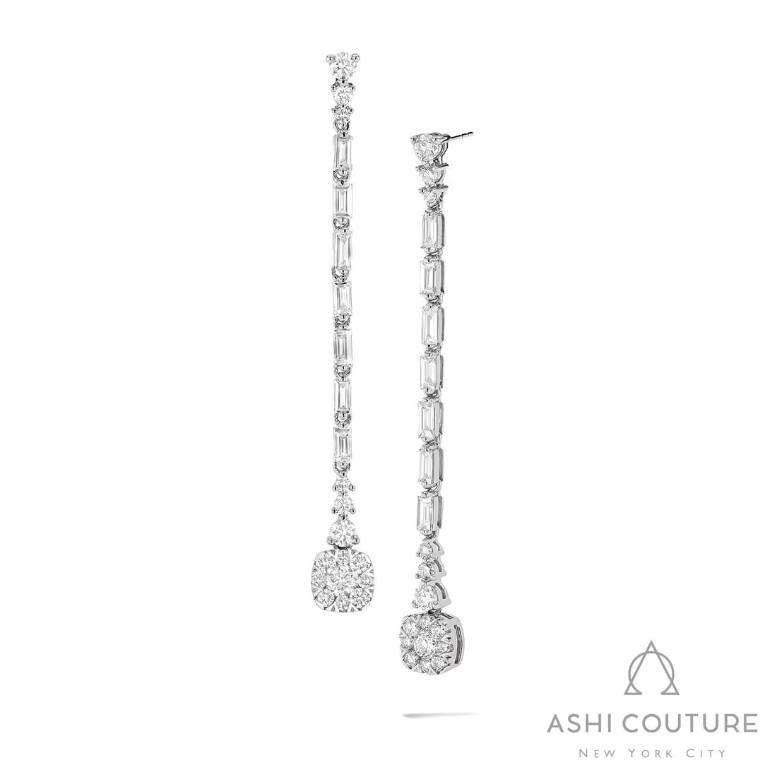1.88 ctw Round & Baguette Diamond Cluster 18K White Gold Drop Earrings: Retail Value: $10,395 A vision of luxury, this exquisite Fiori Drop Cluster pair of earrings featuring White Diamond defines sophistication. Showcasing the gems in a Drop arrangement, the earrings con