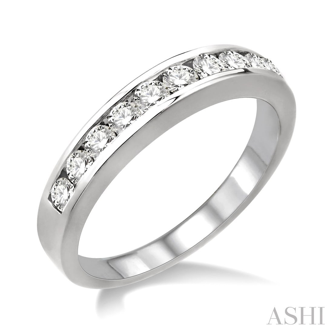 0.50 ctw Diamond Channel Set 14K White Gold Ring: Captured in a moment of brilliance, this magnificent Channel Set Band ring featuring White Diamond speaks to the connoisseur. The gemstones are nestled within a Channel-Set Band framework, supported b