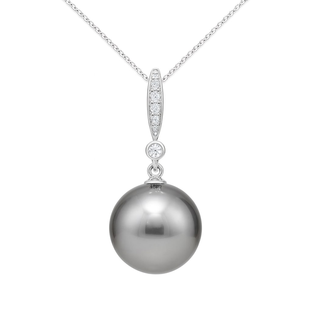 14k White Gold Pearl Pendant Necklace with Diamonds: Exuding sophistication and elegance, this pendant necklace features a lustrous Pearl as its centerpiece. Crafted with precision, the design is enhanced by a series of sparkling Diamonds, totaling 0.03