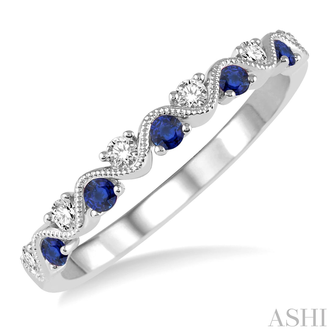 1.8mm Sapphire and 0.15 ctw Diamond 14K White Gold Band Ring: Captured in a moment of brilliance, this magnificent Precious Waves ring featuring Blue Sapphire, White Diamond speaks to the connoisseur. The gemstones are nestled within a Wavy Band framework, suppo