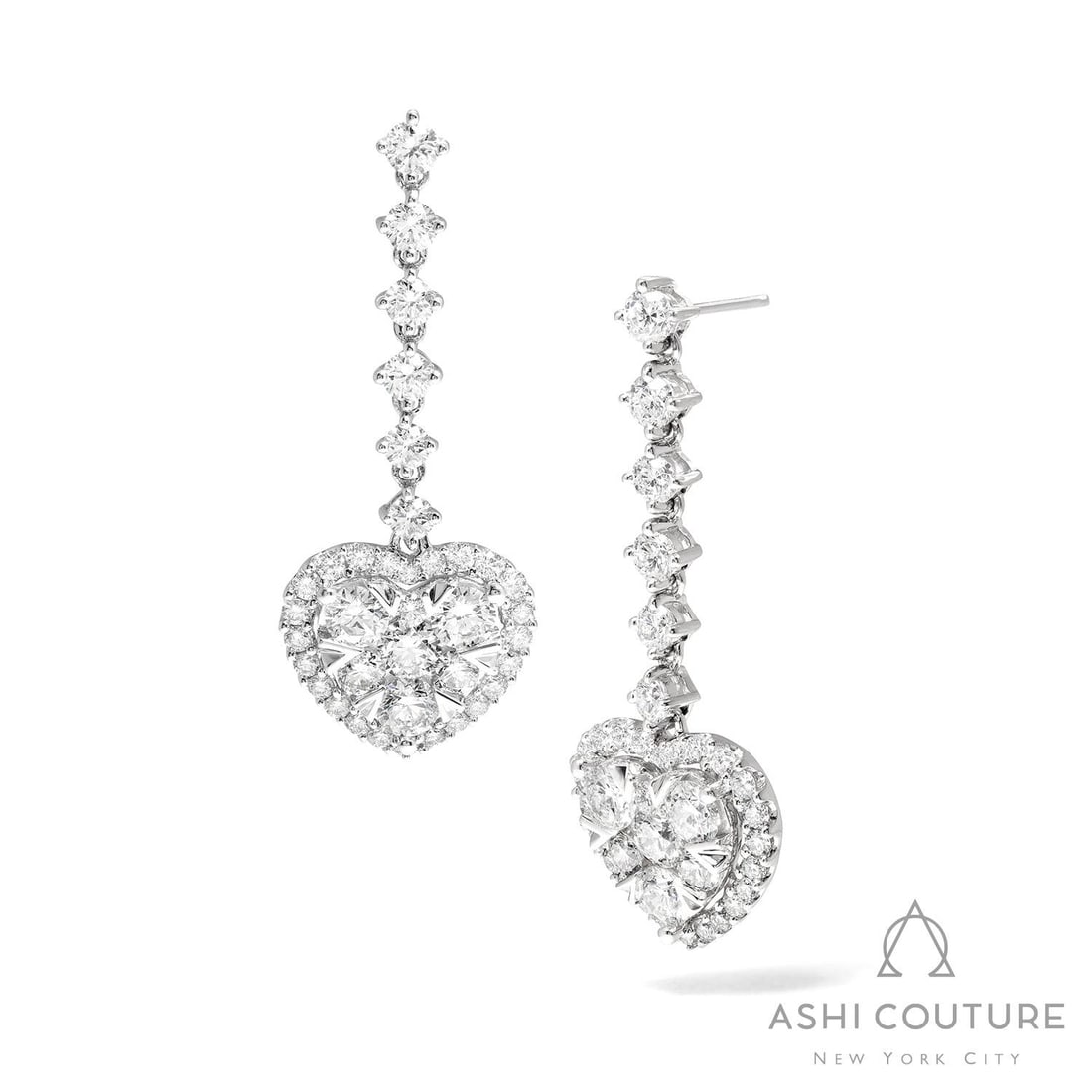 3.82 ctw White Diamond Heart Drop Cluster 18K White Gold Earrings: An exquisite masterpiece of haute joaillerie, this breathtaking Heart Drop Cluster pair of earrings featuring White Diamond is a true treasure. Showcasing the gems in a Halo arrangement, the earrings 