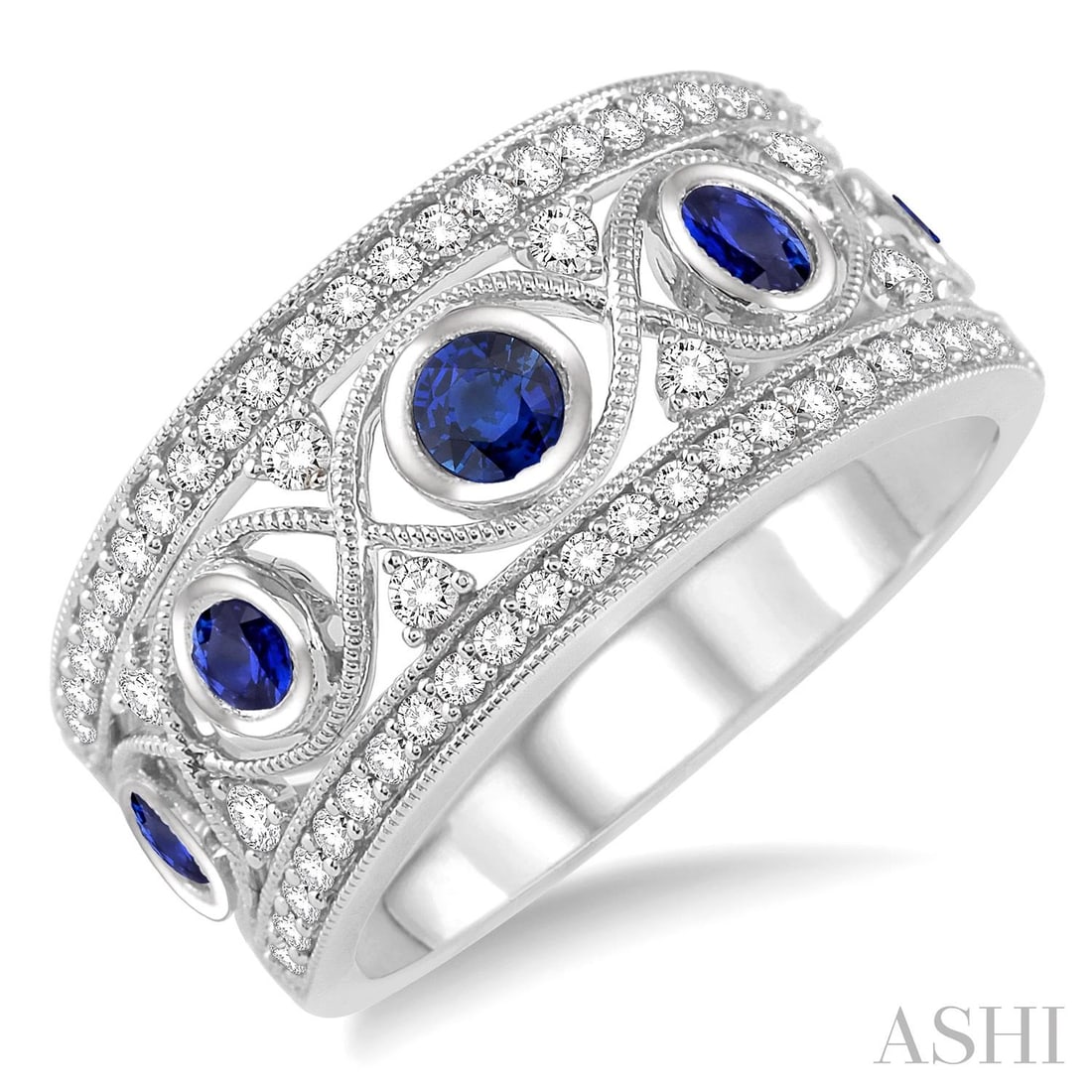 2.6mm Sapphire and 0.47 ctw Diamond 14K White Gold Ring: Defining modern elegance, this stunning Precious Band ring featuring Blue Sapphire, White Diamond captures the essence of style. Securely held in a classic Wide Band/Filigree Setting design, the ring 