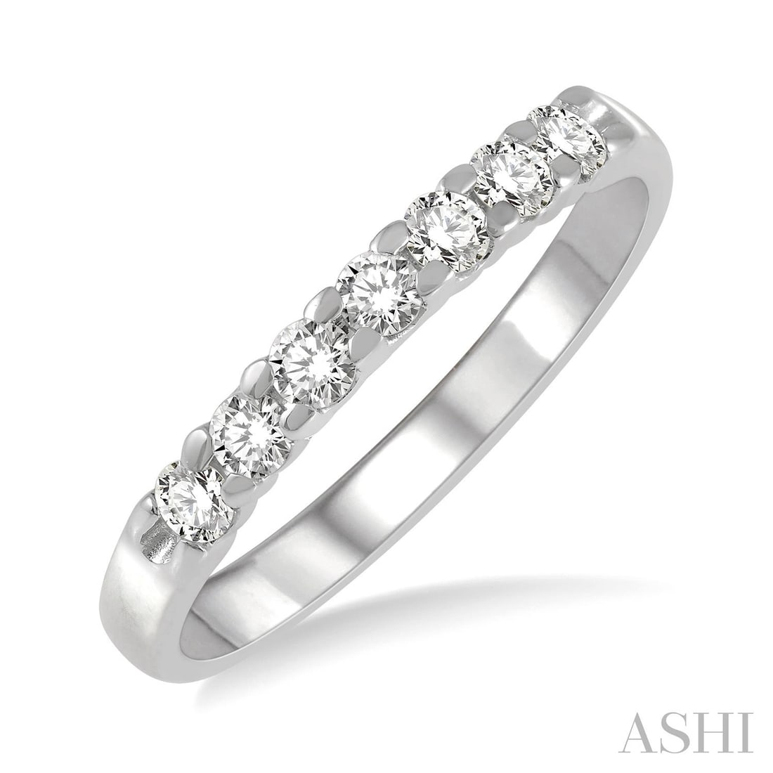 0.35 ctw Diamond 7-Stone Wedding Band in 14K White Gold: A testament to superior craftsmanship, this elegant 7-Stone ring featuring White Diamond is unparalleled. Showcasing the gems in an Anniversary Band arrangement, the ring consists of 2.2 grams of 14K 