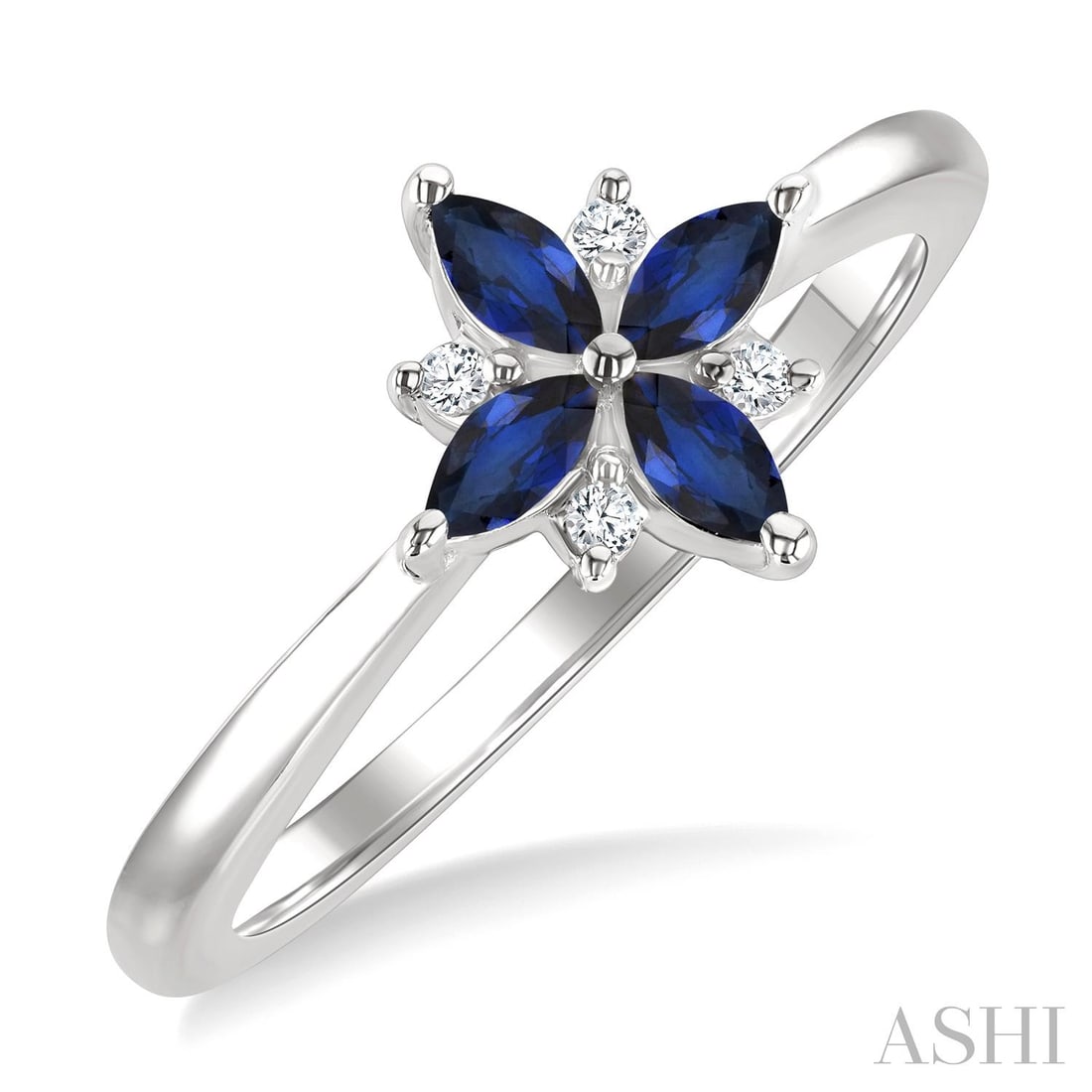 4x2mm Blue Sapphire and 0.04 ctw Diamond 10K White Gold Ring: Exuding opulence and grace, this elegant Floral Blossom ring featuring Blue Sapphire, White Diamond is crafted for the distinguished. Crafted with precision, the Cluster setting is seamlessly integrat