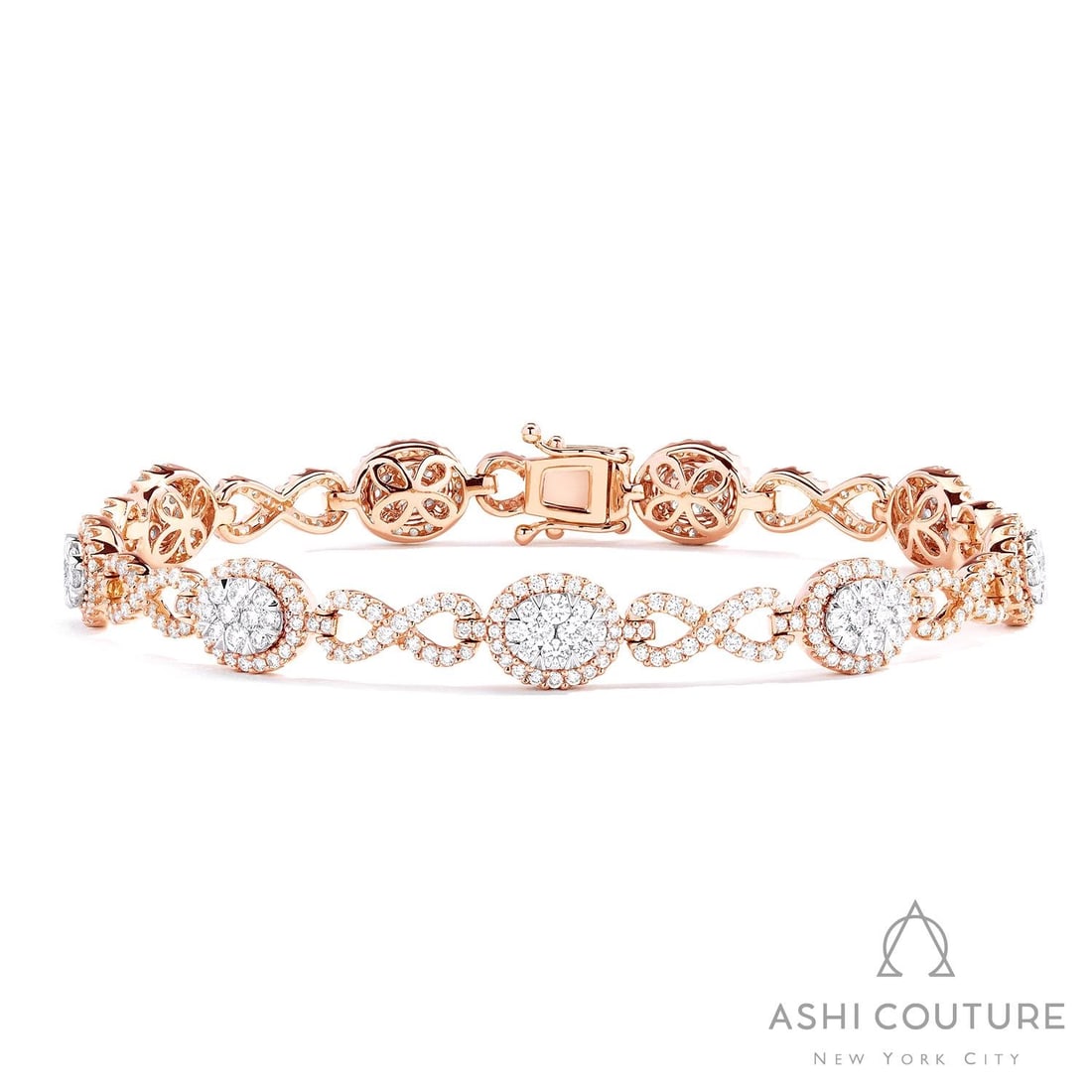 3.06 ctw Diamond Fiori Infinity Alternating 18K Rose & White Gold Bracelet: Epitomizing grandeur, this magnificent Fiori Oval And Infinity Alternating bracelet featuring White Diamond stands as a beacon of refined taste. Showcasing the gems in a Cluster arrangement, the brace