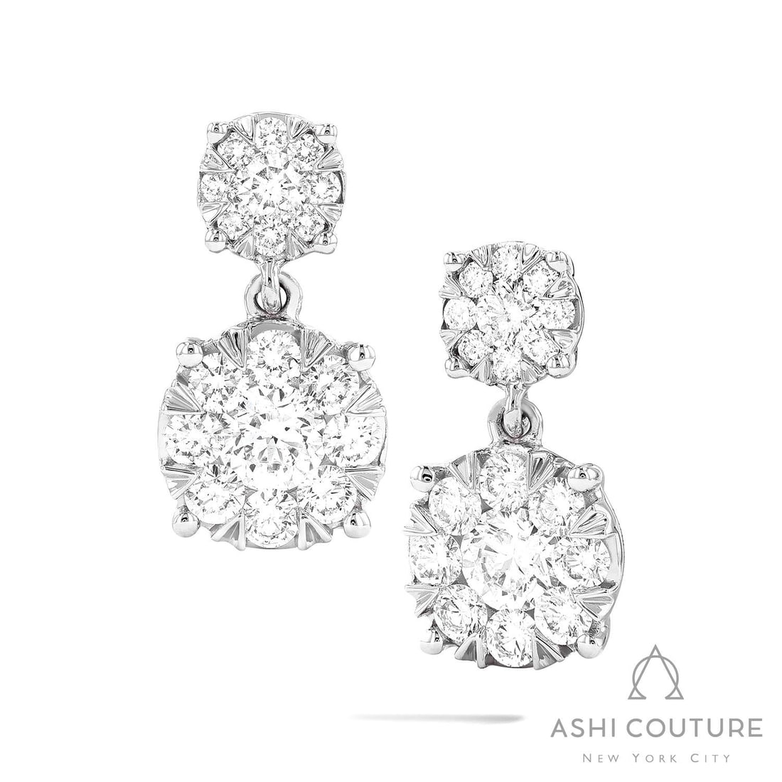1.42 ctw White Diamond Fiori Drop Cluster 18K White Gold Earrings: Defining modern elegance, this stunning Fiori Drop Cluster pair of earrings featuring White Diamonds captures the essence of style. The gemstones are nestled within a Cluster framework, supported by a