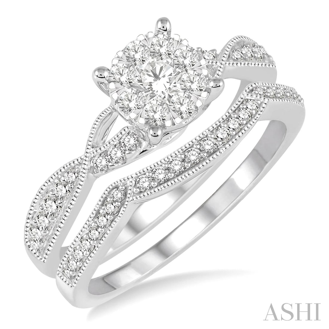 0.64 ctw Diamond Cluster Bridal Set Engagement Ring & Band 14K White Gold: A symphony of light and color, this magnificent Cluster bridal set featuring White Diamond embodies the pinnacle of luxury. Securely held in a classic Cluster design, the bridal set is forged from 5.0