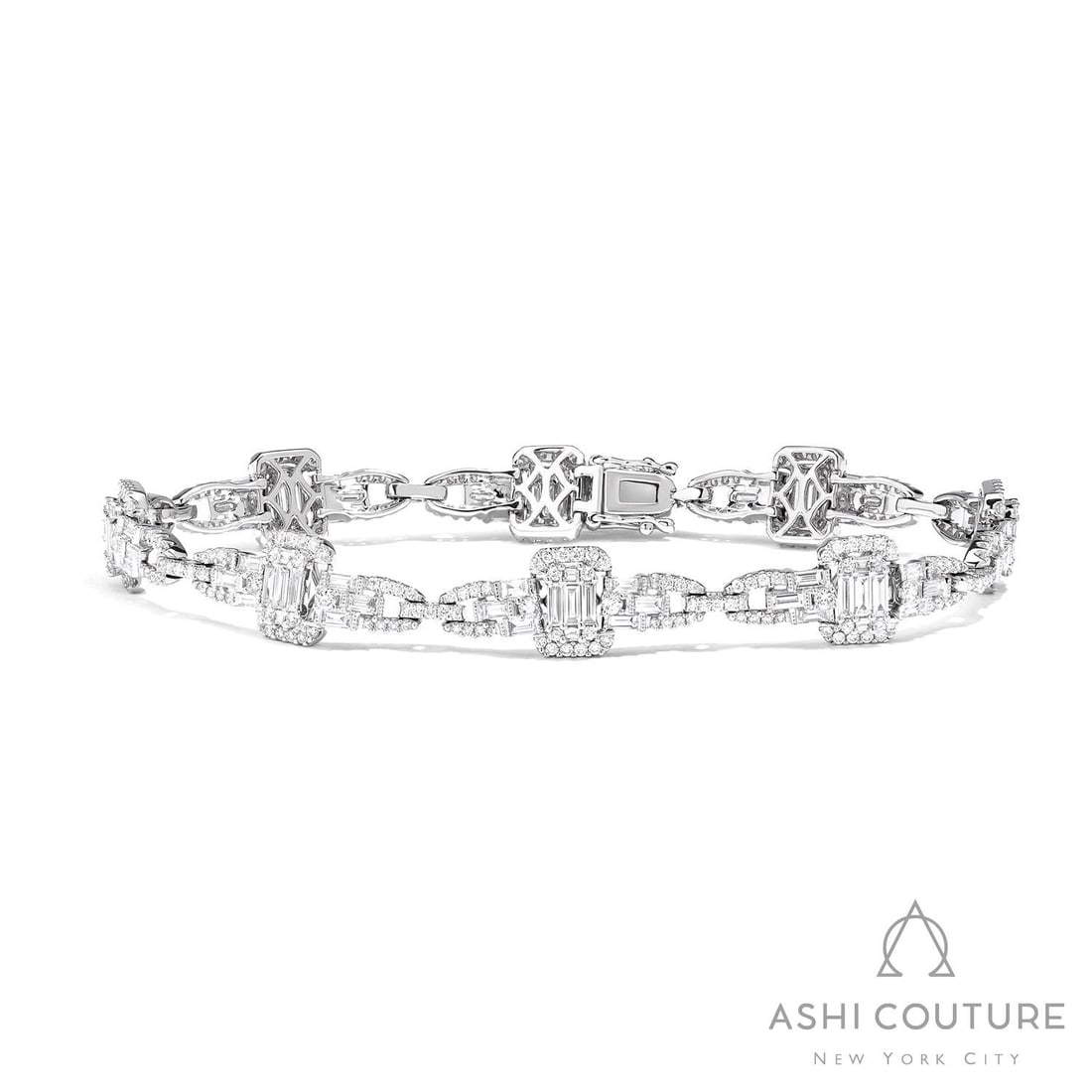 Empress 3.9 ctw Baguette & Round Diamond 18K White Gold Bracelet: Captured in a moment of brilliance, this magnificent Baguette Link bracelet featuring White Diamond speaks to the connoisseur. Expertly mounted in a Link setting, the bracelet is crafted in 14.9 grams