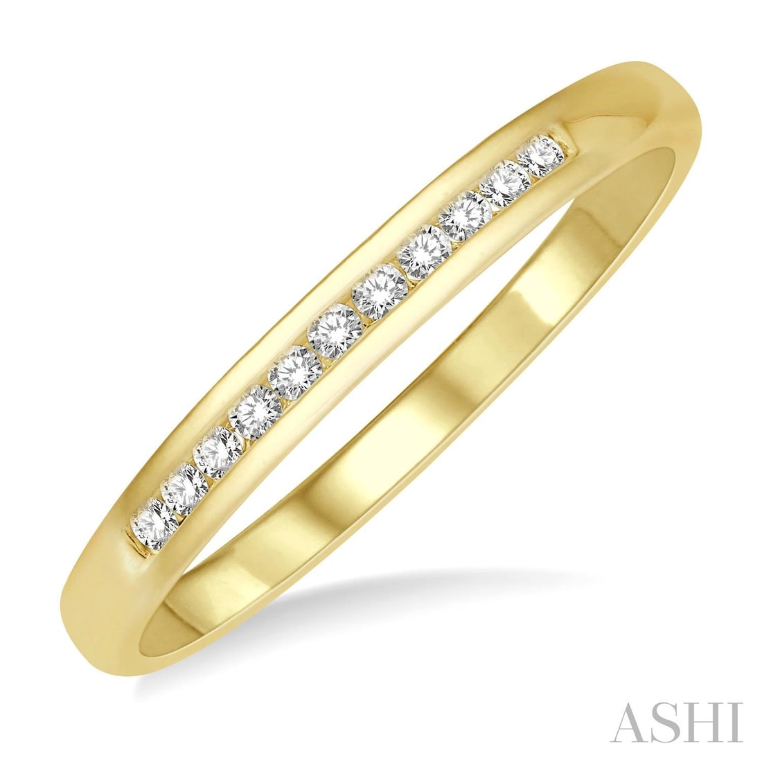 0.10 ctw White Diamond Channel Set 14K Yellow Gold Wedding Band: A vision of luxury, this elegant Channel Set ring featuring White Diamond defines sophistication. Expertly mounted in a Channel setting, the ring is crafted in 1.9 grams of solid 14K Yellow Gold. This
