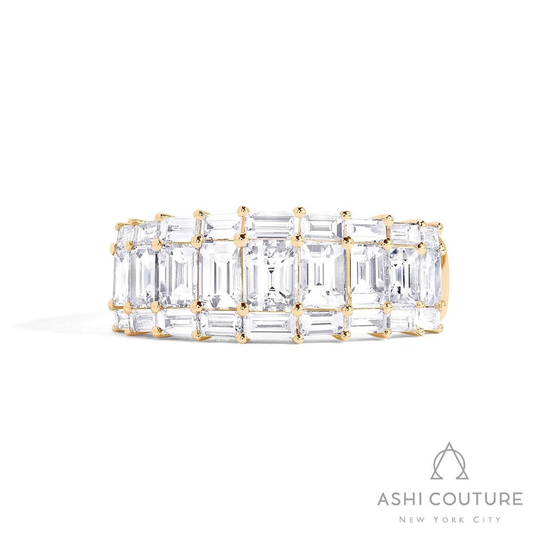 2.41 ctw Baguette Diamond Duchess Band 18K Yellow Gold Ring: Retail Value: $15,345 Exuding opulence and grace, this magnificent Duchess Emerald Cut band ring featuring White Diamond is crafted for the distinguished. The gemstones are nestled within a Multi-Row 