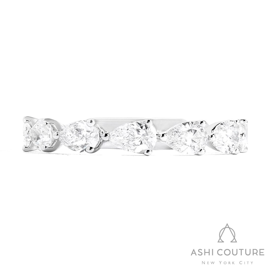 1.40 ctw Pear White Diamond East-West Halfway Band 18K White Gold Ring: Epitomizing grandeur, this magnificent East-West Pear Halfway Band ring featuring White Diamond stands as a beacon of refined taste. Showcasing the gems in a Halfway Band arrangement, the ring consist