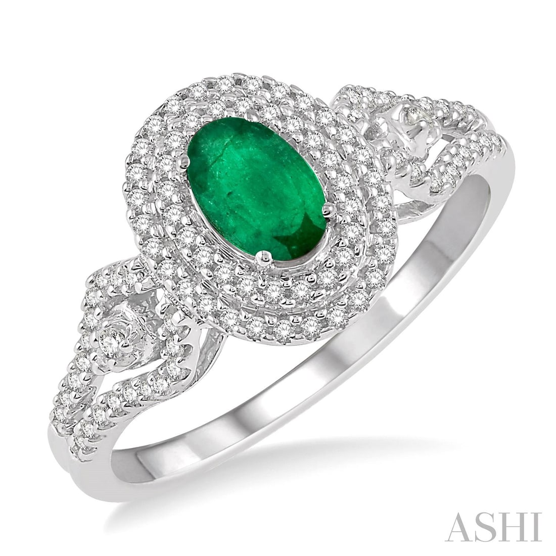 6x4mm Emerald and 0.30 ctw Diamond 14K White Gold Ring: Epitomizing grandeur, this magnificent Double Halo ring featuring Emerald, White Diamond stands as a beacon of refined taste. A detailed Double Halo gallery secures the stones, rendered in 3.5 grams o